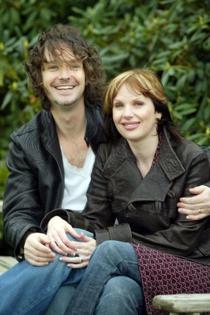 Roger and Lara Griffiths, Lotto winners, smiling together.
