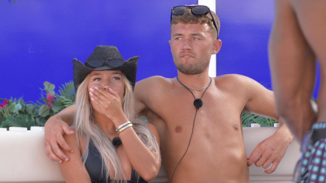 Ellie Chadwick and Finley Maddock looking surprised on Love Island.