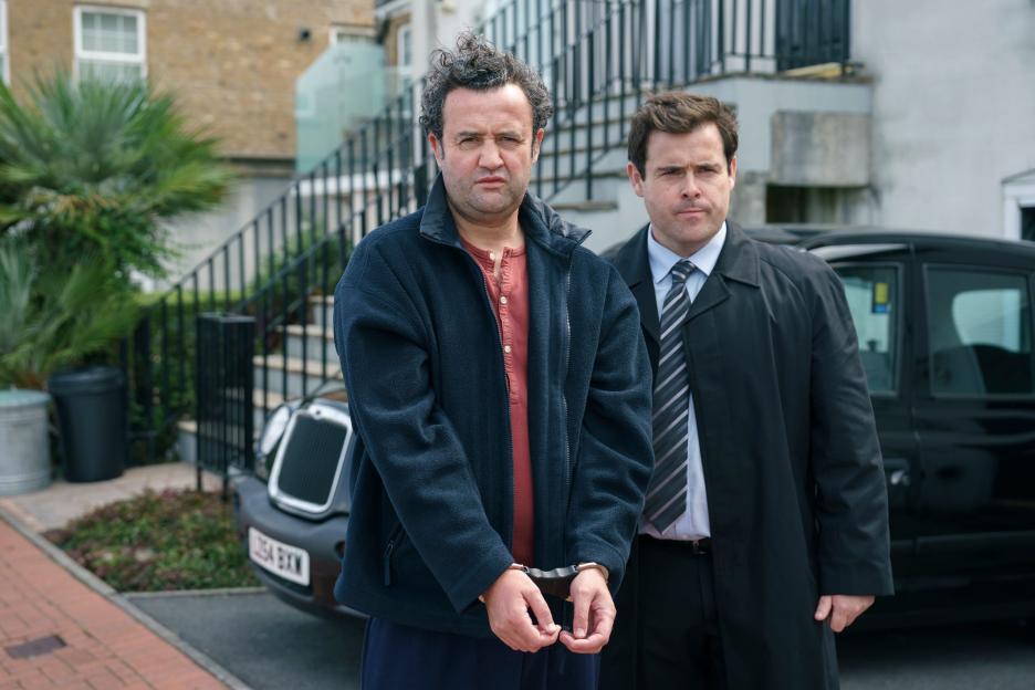 David Fynn as DS Warrilow and Daniel Mays as John Worboys in the TV Show 'Believe Me'.