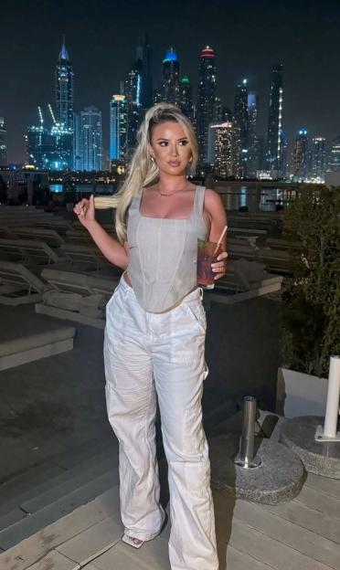 Chloe Bennett in Dubai at night.