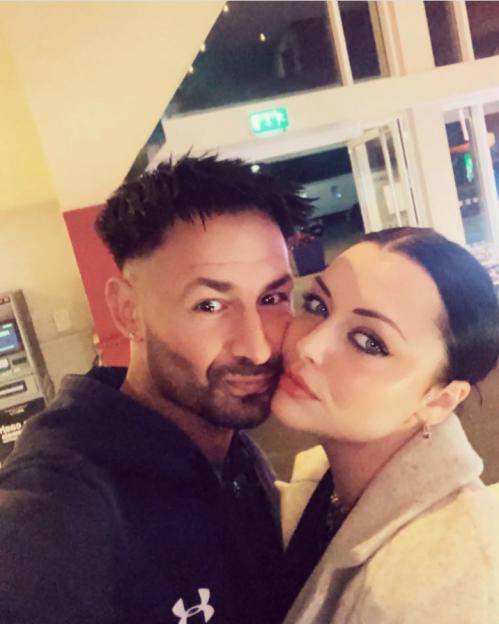 David Bracken and Shona McGarty embracing.