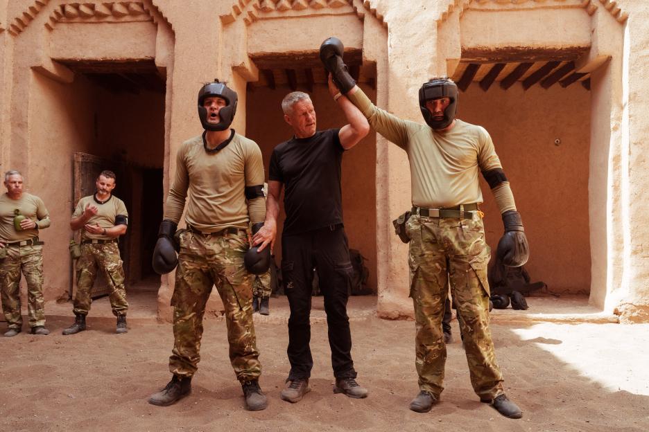 DS Billy announcing Ben Cohen as the winner of the fight with Axle Whitehead, with other recruits.