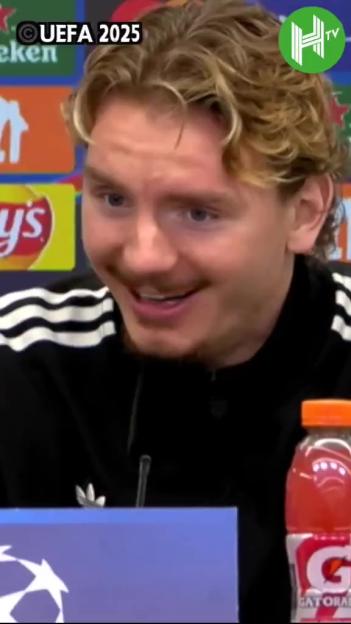 Nick Woltemade laughing at a press conference.