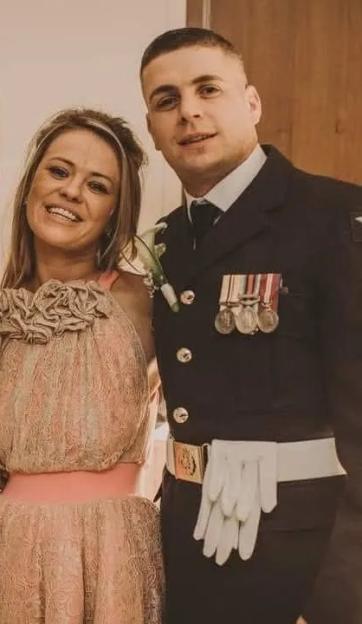 Jonathan Haggerty with his sister Danielle and another woman, dressed in a white wedding gown, at a formal event.