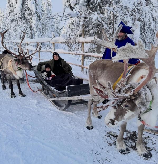 Phil Foden and his family riding a reindeer sleigh in Lapland.