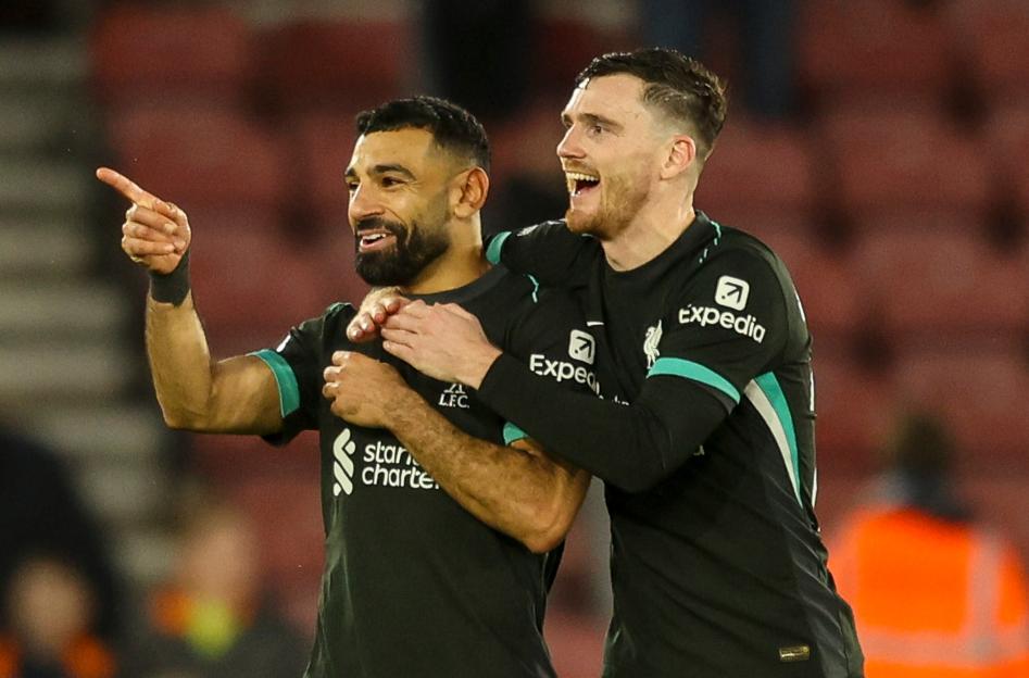 Mohamed Salah and Andy Robertson of Liverpool celebrating a 3-2 win against Southampton.