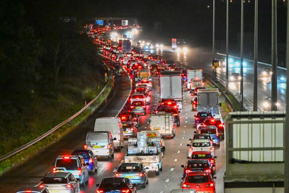 Traffic at a standstill on the M5 motorway at night.