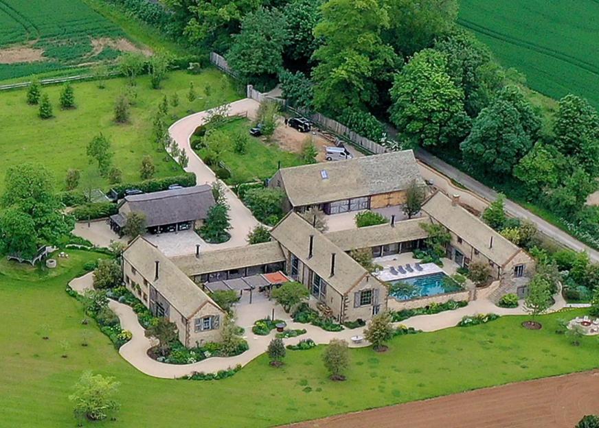 Great Tew, near Chipping Norton, UK. June 4th 2021. Aerial view of The Home David and Victoria Beckham in Great Tew. Credit: Sam Bagnall