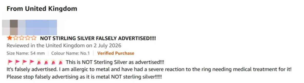 A 1-star product review stating the item is falsely advertised as sterling silver and caused an allergic reaction.