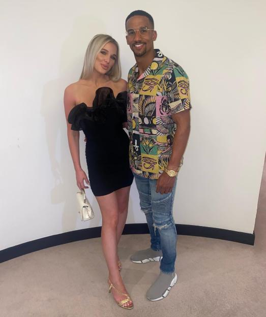Helen Flanagan and Scotty Sinclair posing together.