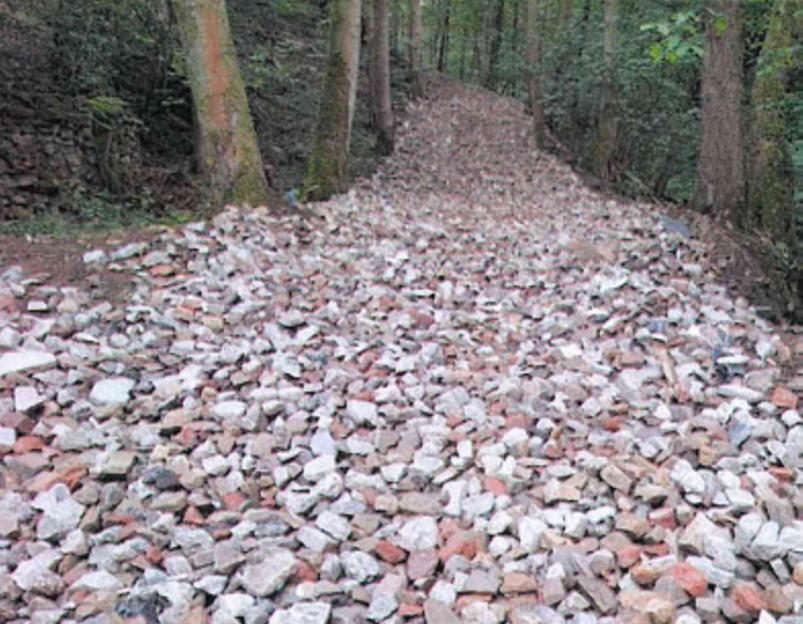 Illegally built access track made from rubble at Jacobs Hill Farm.