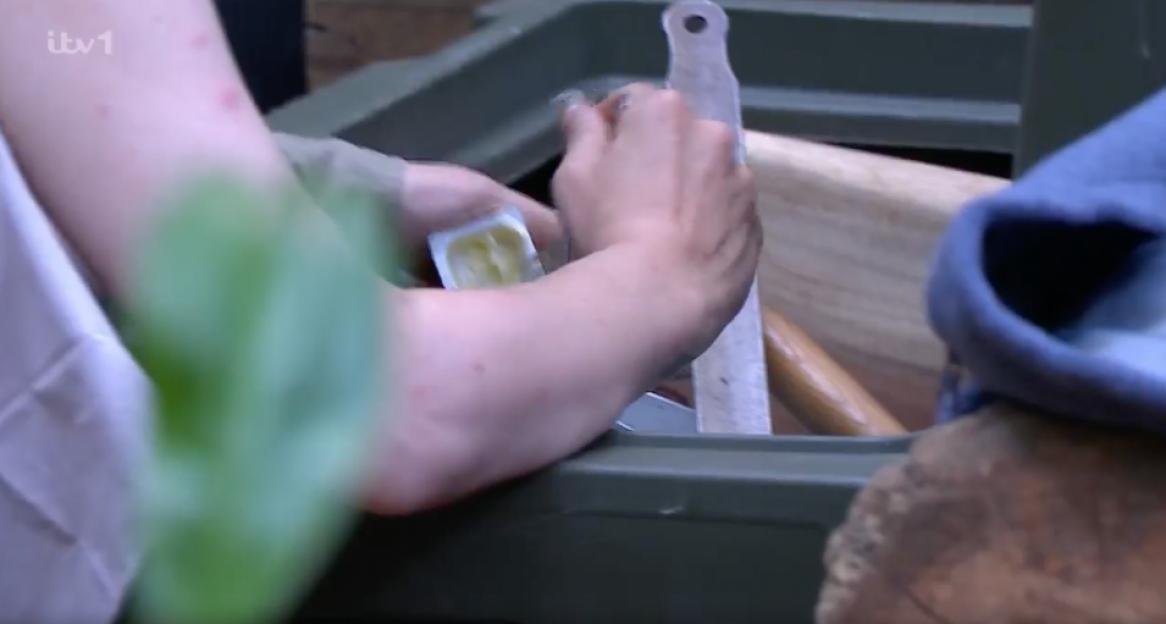 Shona McGarty adding butter to rice.