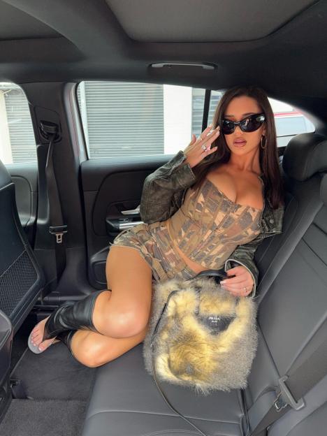 Love Island Sensation with the Show's Biggest Bust Stuns in Camo Corset and Mini Skirt After Stealing a Kiss from Demi Sims!