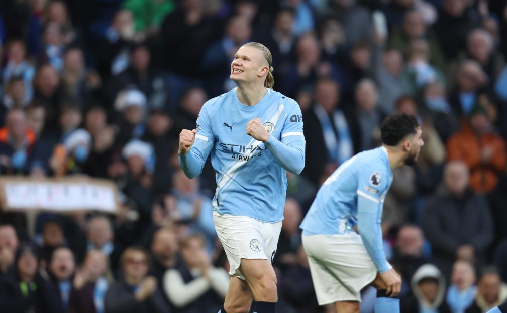 Erling Haaland celebrating a goal for Manchester City.