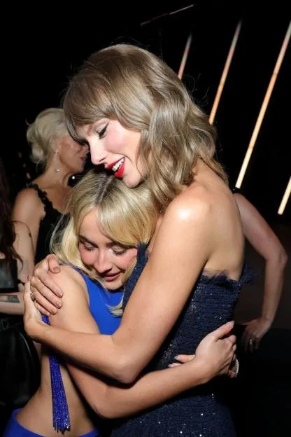 Sabrina Carpenter and Taylor Swift hugging at the Academy Museum Gala.
