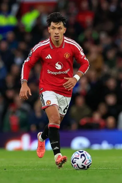 Lisandro Martinez of Manchester United runs with the ball during the Premier League match against Tottenham Hotspur.