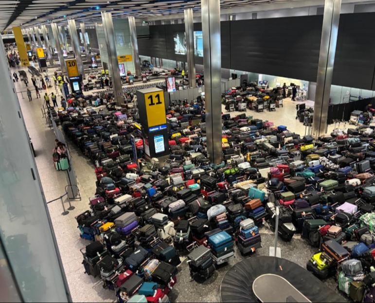 A baggage hall at Heathrow Terminal 5 filled with hundreds of unclaimed bags.