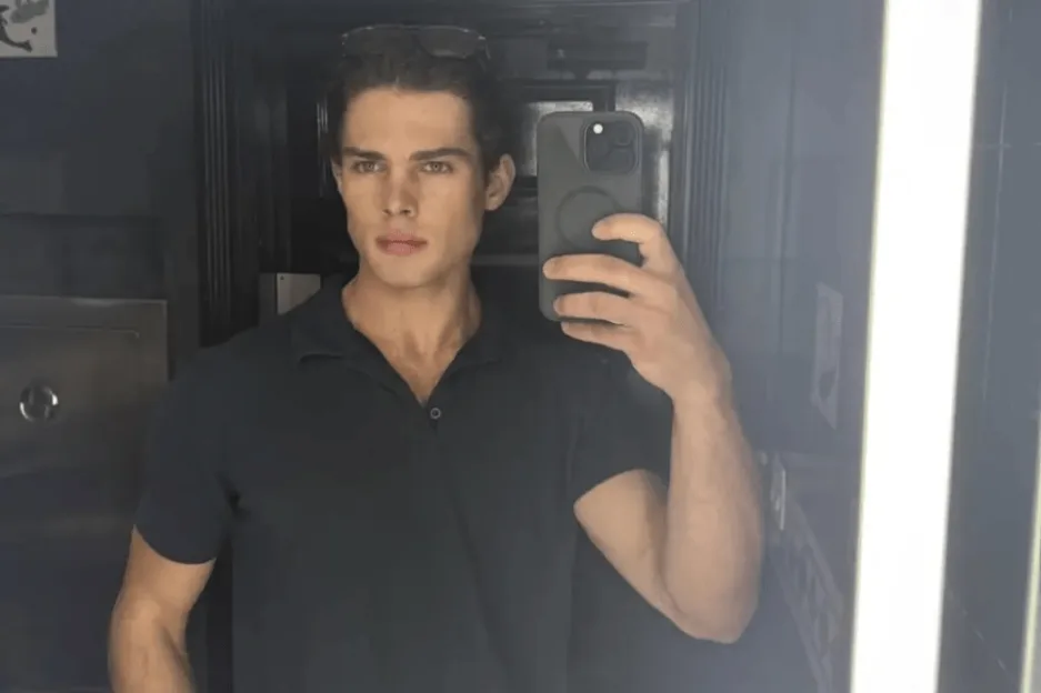 Looksmaxxing influencer Clavicular taking a selfie in a mirror.