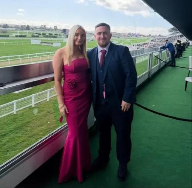 Faith Millar and Luke Littler standing together at a racetrack.
