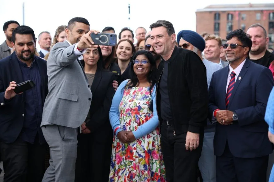 A group of people taking a selfie with Labour Party members at a Women's Conference Day event.
