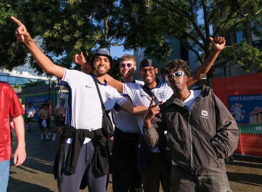 Members of the Beta Squad YouTube collective, including Niko Omilana, King Kenny TV, and AJ Shabeel, pose together in Berlin during UEFA Euro 2024.