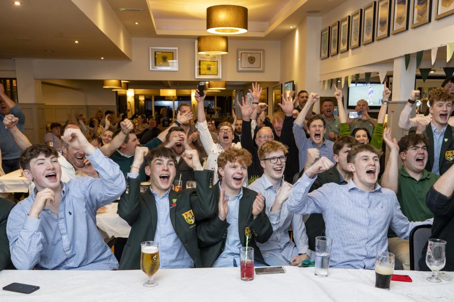 Holywood Golf Club members watch the final day of the US Masters 2026