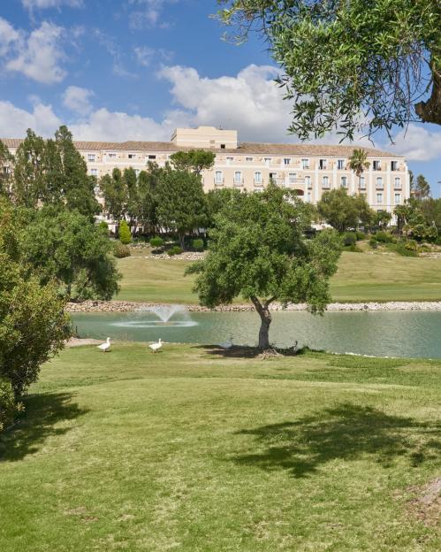 Colin Montgomerie makes his birdie putt on the 12th hole at the Volvo Masters Golf at Montecastillo, Spain.