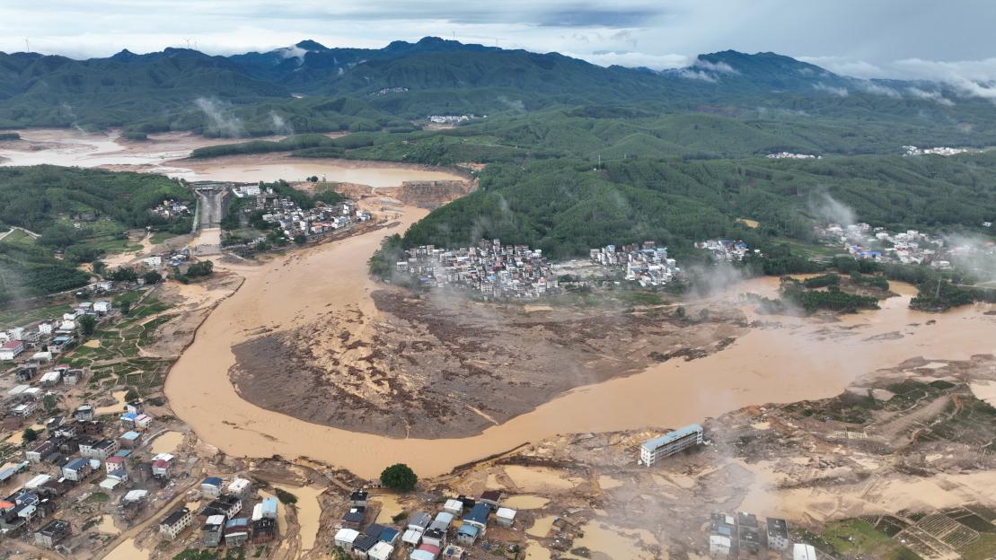 Flood damage downstream after the Liulan reservoir dam breach in Hengzhou