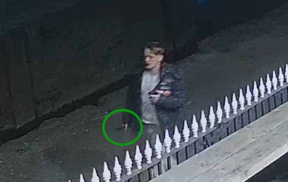Security camera footage showing Byrne walking away with a knife in his hand.