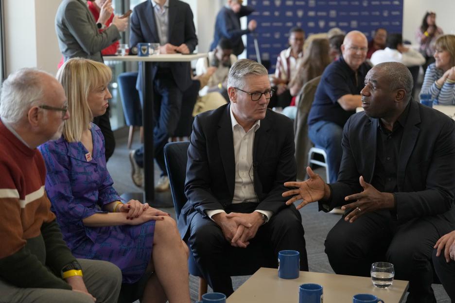 Prime Minister Sir Keir Starmer and Foreign Secretary David Lammy meeting Labour Party members.