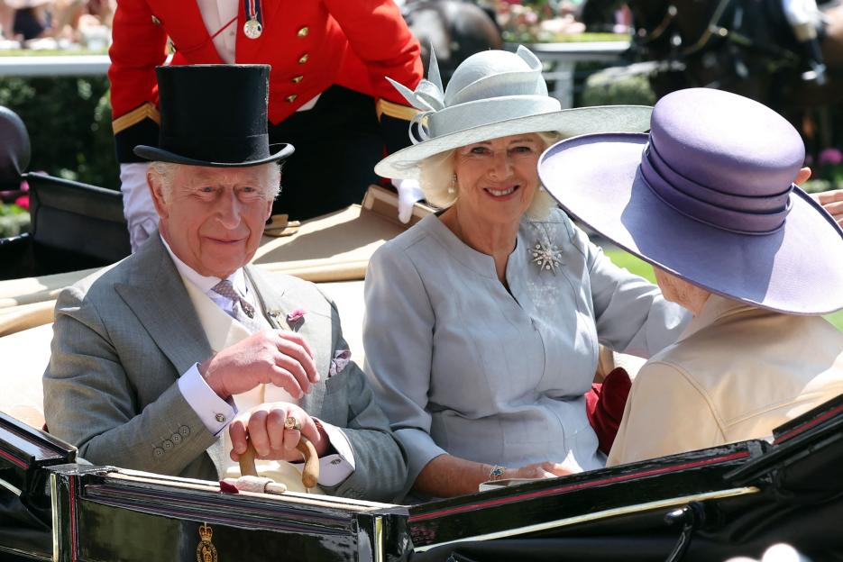 King Charles and Queen Camilla in a carriage at Royal Ascot.
