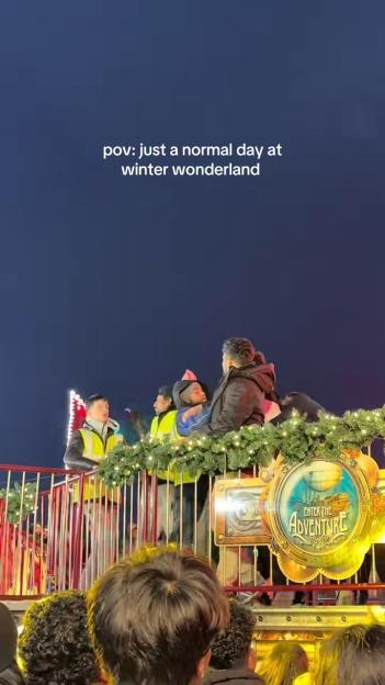 People on a moving ride at Winter Wonderland, with text "pov: just a normal day at winter wonderland".