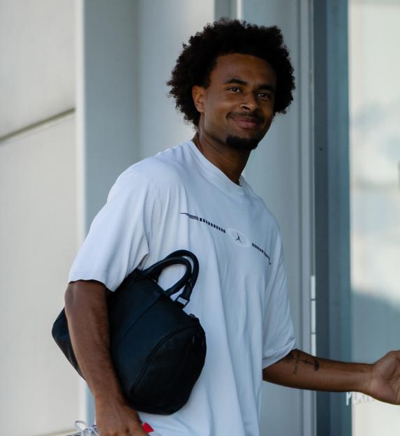 Manchester United player, Hannibal Mejbri, in a red jersey during a pre-season friendly.
