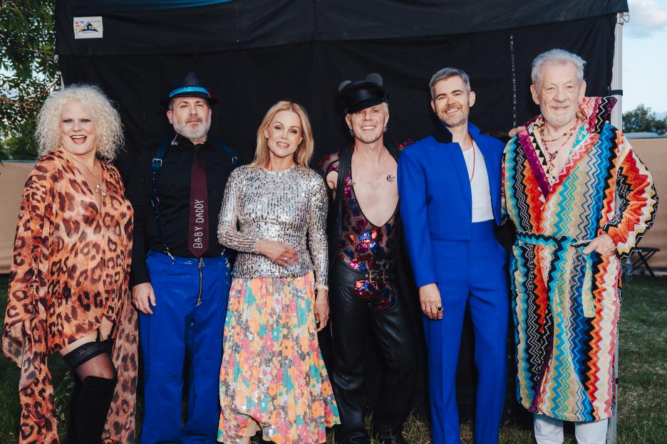 Amber Martin, Babydaddy, Belinda Carlisle, Jake Shears, Del Marquis, and Ian McKellen posing together at Mighty Hoopla.