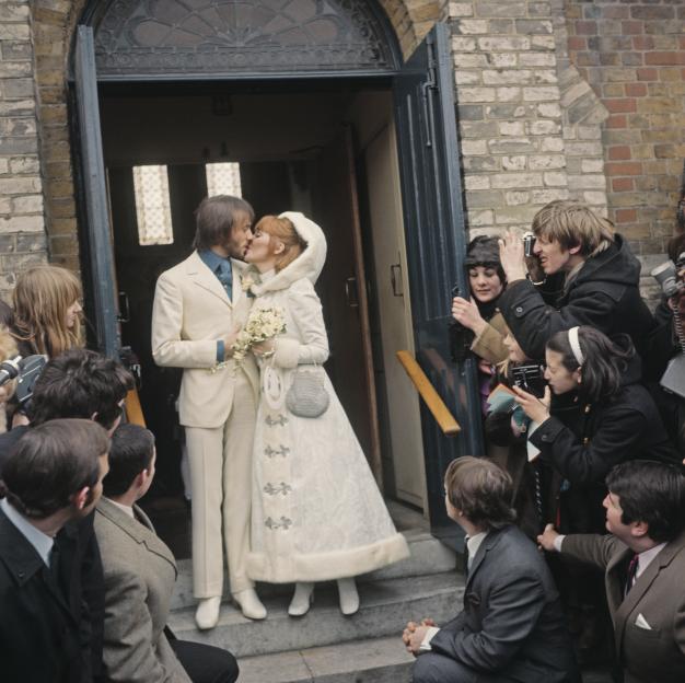 Scottish pop singer Lulu and English musician Maurice Gibb after their wedding.
