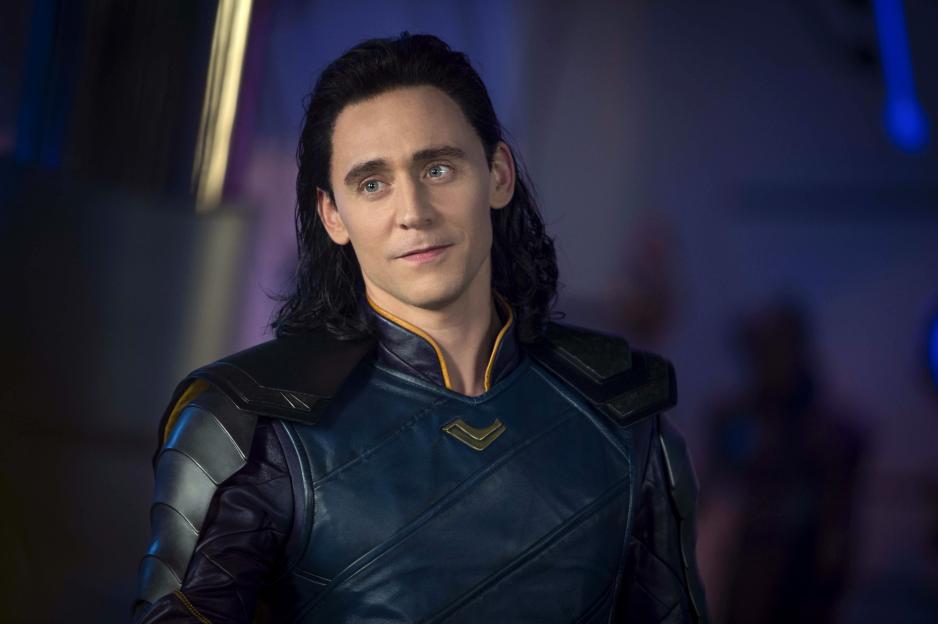 Tom Hiddleston as Loki in "Thor: Ragnarok," dressed in his blue and gold costume.