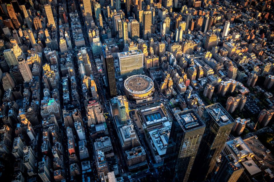 Aerial view of Midtown Manhattan cityscape with Madison Square Garden.