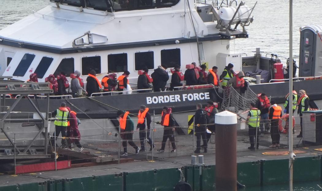 People thought to be migrants are brought to Dover, Kent, from a Border Force vessel following a small boat incident in the Channel.