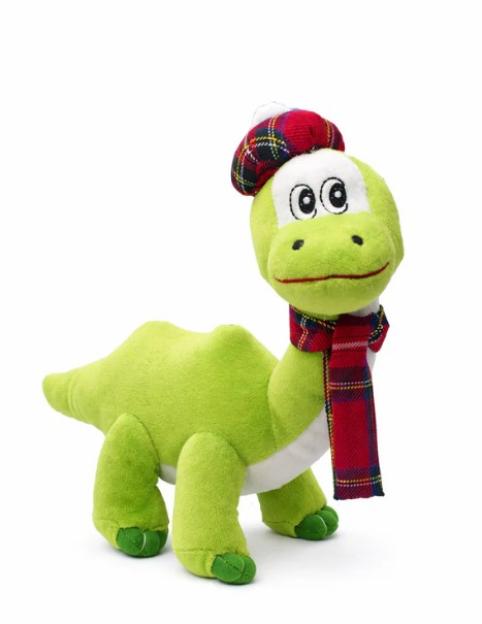 Green plush toy resembling the Loch Ness Monster, wearing a red tartan hat and scarf.