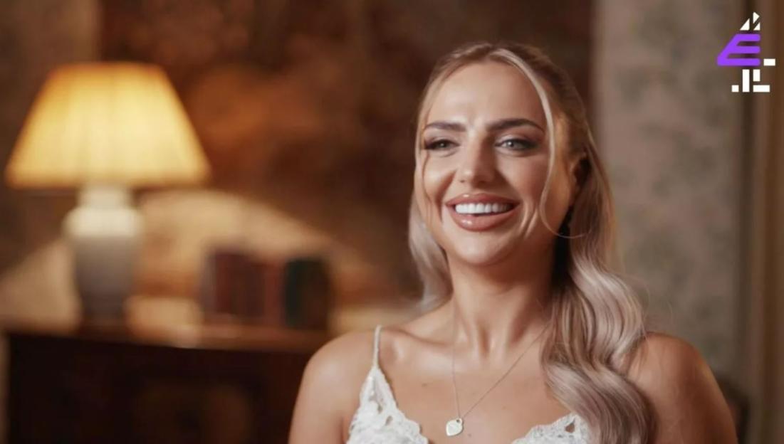 Adrienne Naylor smiling.