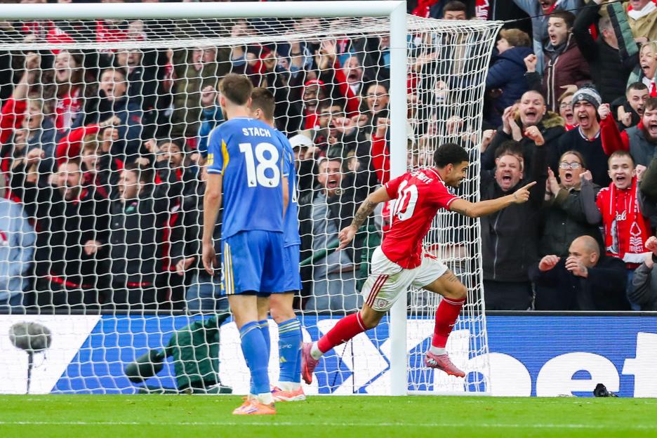 Morgan Gibbs-White of Nottingham Forest celebrates scoring a goal during a football match.