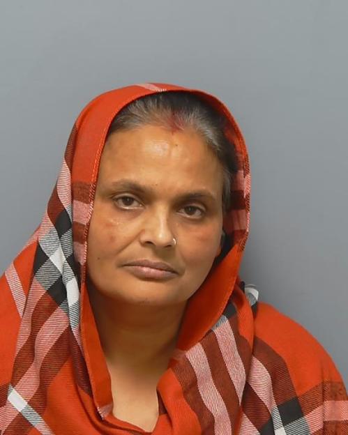 Kiran Kaur, 53, charged with assisting an offender.