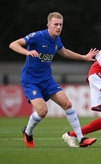Reggie Watson of Chelsea U21 in a blue uniform playing soccer against Arsenal U21.