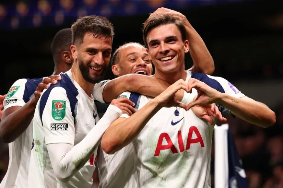 Tottenham Hotspur players celebrate a goal against Doncaster Rovers.
