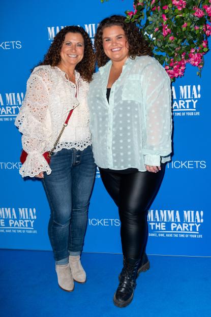 Amy Tapper and a guest at the Mamma Mia! 2023 Gala.