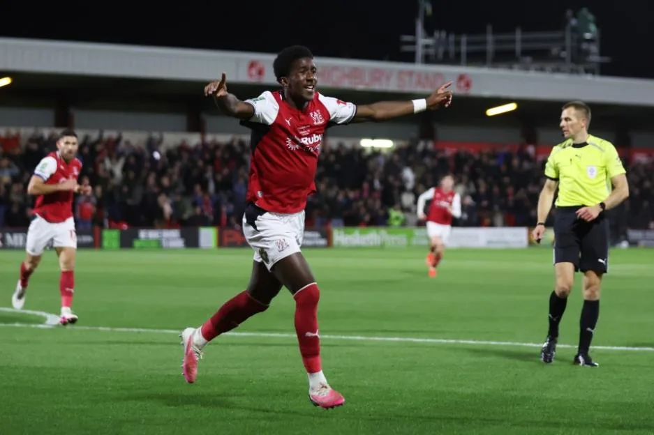 Aaron Loupalo-Bi of Fleetwood Town celebrates scoring his team's first goal during the Carabao Cup match between Fleetwood Town and Arsenal at Highbury Stadium.