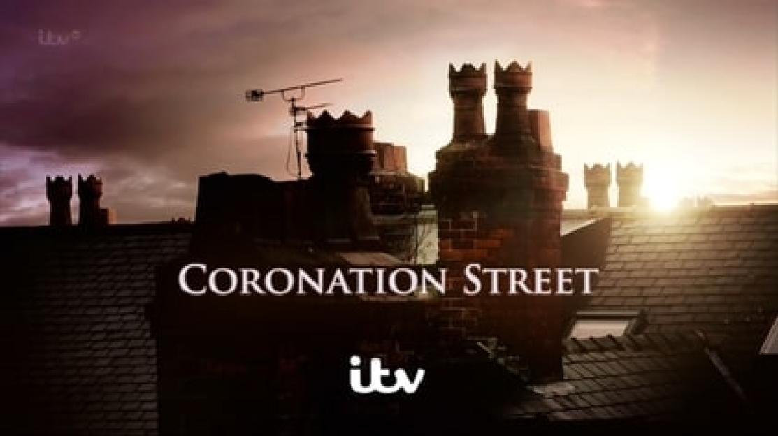 The Coronation Street logo featuring rooftops and chimneys against a sunset.
