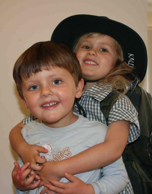 Jeremy and his sister Kalena embracing.