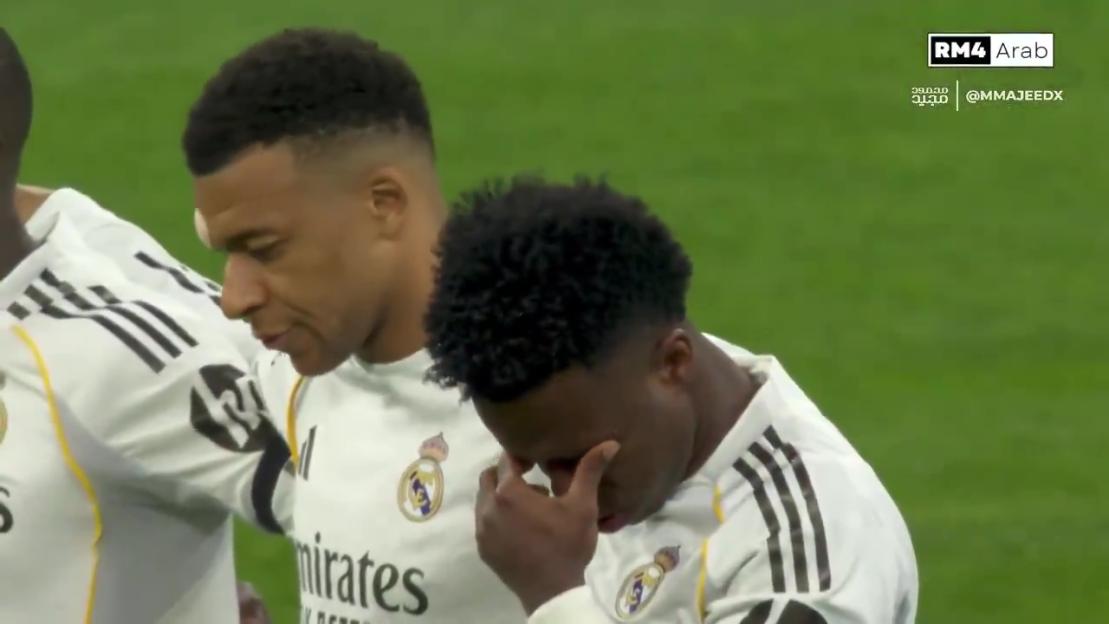 Kylian Mbappe shakes his head in disgust.