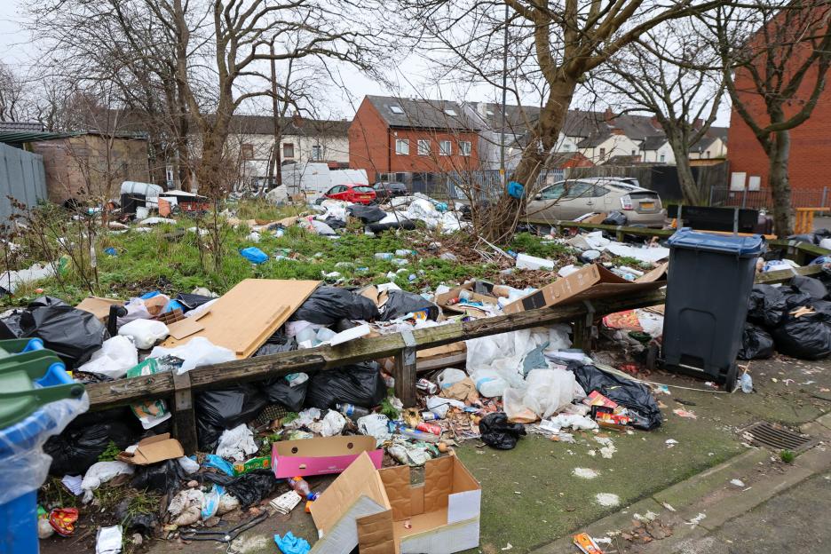 A large pile of trash and bin bags on Grove Cottage Road in Bordesley Green Birmingham, resulting from an ongoing bin strike.